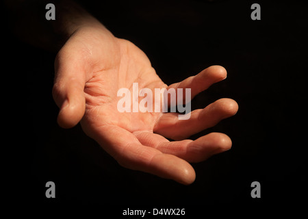 Halten Sie eine helfende Hand Stockfoto