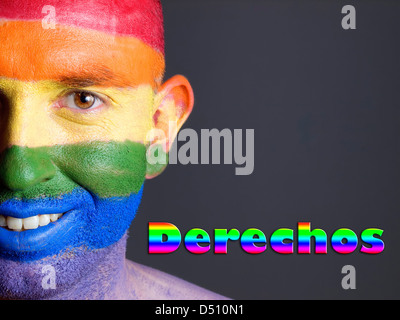 Hombre Con la Bandera Homosexuell Pintada de la Cara y Sonriendo. La Palabra "Derechos" Esta Escrita En un Lado. Stockfoto