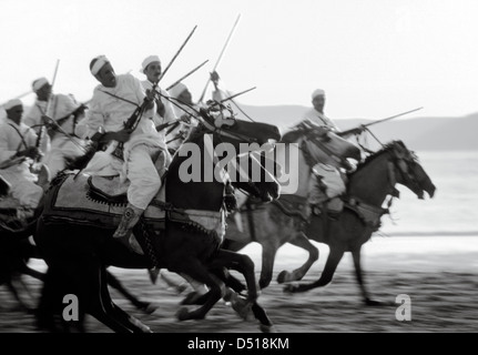 Eine Fantasie Kavallerieattacke am Strand von Essaouira Stockfoto