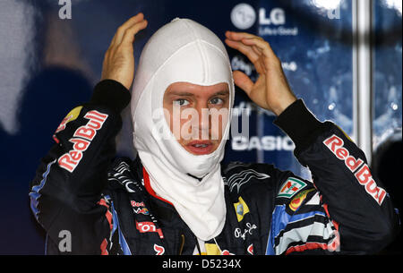 Deutschen Fahrer Sebastian Vettel von Red Bull ist vor Beginn des Grand Prix von Japan auf dem Suzuka Circuit in Suzuka, Japan, 7. Oktober 2010 abgebildet. Foto: Jens Büttner Stockfoto