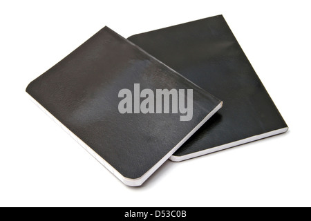 Kleine Notebooks, die isoliert auf weißem Hintergrund Stockfoto