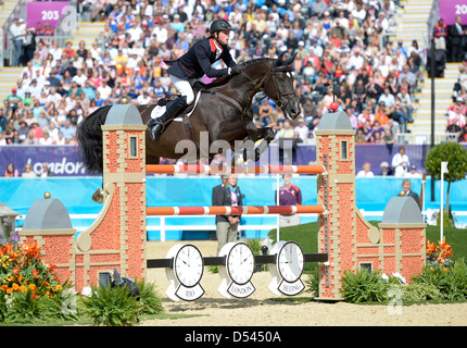 Ben Maher Reiten Tripple X (GBR, Großbritannien). Team-Springreiten Stockfoto