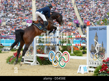 Rolf-Göran Bengtsson mit Casall (SWE, Schweden). Team-Springreiten Stockfoto