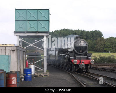 Annäherung an Weybourne Bahnhof von Sheringham auf die North Norfolk Railway Dampflok Stockfoto