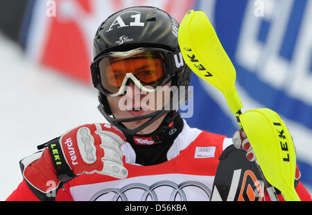 Österreichs Reinfried Herbst Jubel an der Ziellinie im Welt Cup Finale im Slalom in Garmisch-Partenkirchen, Deutschland, 13. März 2010. Foto: PETER KNEFFEL Stockfoto