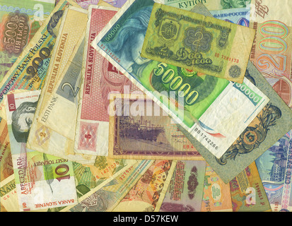 Bunte alte World Paper Money-Hintergrund Stockfoto