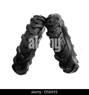 Neue, unbenutzte schwarze Grubber Reifen. Landwirtschaft und Landwirtschaft Hintergrundbild. Stockfoto