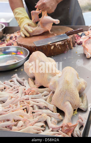 Huhn-Metzger am nassen Markt in Asien Stockfoto