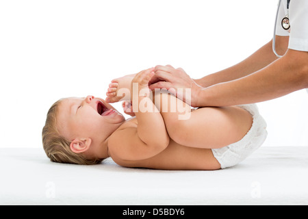 Arzt macht Gymnastik Babymädchen Stockfoto