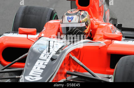 Deutscher Rennfahrer Timo Glock von Virgin Racing fährt sein Auto über das Rennen verfolgen, während der dritten Training auf der Rennstrecke von Spa-Francorchamps in der Nähe von Spa, Belgien, 28. August 2010. Die 2010 ist Formel 1 Grand Prix von Belgien am 29. August 2010 statt. Foto: Peter Steffen Stockfoto