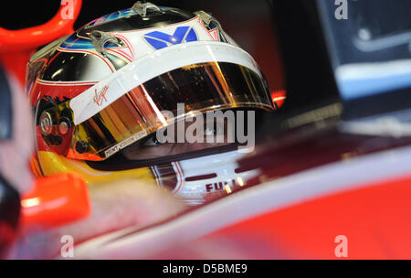 Deutscher Rennfahrer Timo Glock von Virgin Racing sitzt in seinem Rennwagen während der dritten Trainingseinheit auf dem Autodromo Nazionale in Monza-Rennstrecke in Italien, 11. September 2010. Die 2010 ist Formel Eins italienischen Grand Prix am 12. September 2010 statt. Foto: Peter Steffen Stockfoto