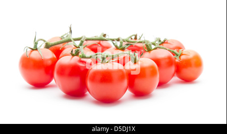 Gruppe von Kirschtomaten isoliert auf weißem Hintergrund Stockfoto