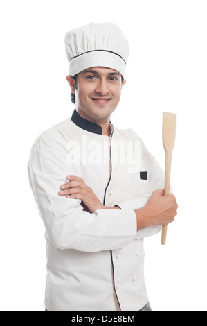 Porträt eines männlichen Chef hält einen Spachtel und lächelnd Stockfoto