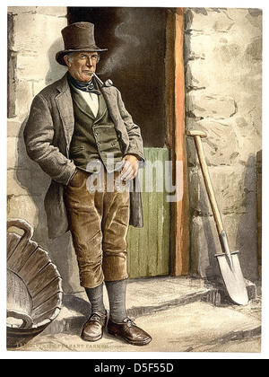 Ein Porträt eines irischen Bauern, das den ländlichen Lebensstil in Irland während des späten 19. Oder frühen 20. Jahrhunderts zeigt. Dieses historische Foto spiegelt das Leben der irischen Bauern in der Arbeiterklasse und ihre Verbindung zum Land wider. Stockfoto