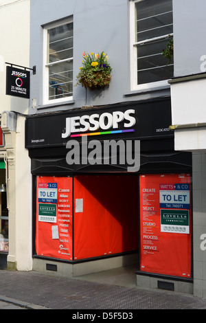 Vakanten Jessops Shop in Guernsey Stockfoto