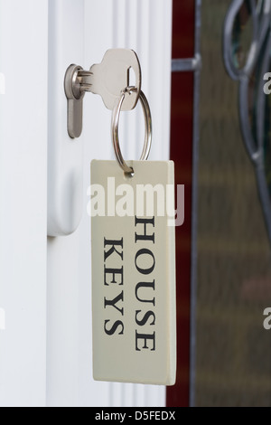 Haus-Tür-Schlüssel und Tag Nahaufnahme Stockfoto