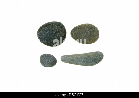 Vier glatte, Runde Strand Steinen von Maine Granit und Schiefer. Stockfoto