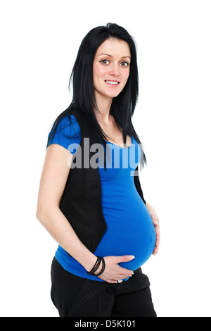 Porträt einer glückliche junge schöne schwangere Frau mit Händen über Bauch, isoliert. Stockfoto