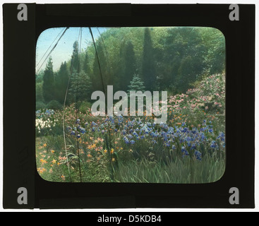 Ein Foto von Killenworth, dem George Dupont Pratt House in Glen Cove, New York. Das Herrenhaus ist in seiner Gartenanlage festgehalten und zeigt die Architektur und die Landschaftsgestaltung. Stockfoto