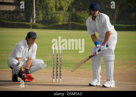 Schlagmann und wicketkeeper Stockfoto