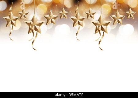 Golden und glänzend Sternen auf weißem Hintergrund isoliert Stockfoto