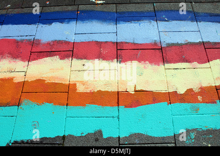 Farbe auf dem Bürgersteig Stockfoto