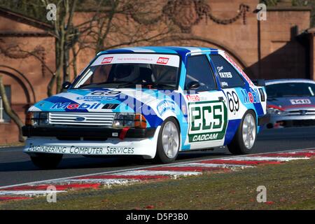 Tarporley, England. 6. April 2013. Stephen Yates in seinem Ford Escort RS1600i während BARC Rennveranstaltung am Oulton Park Stockfoto