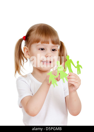 Kleines Mädchen hält und zeigt auf Familie schneiden aus Papier Stockfoto