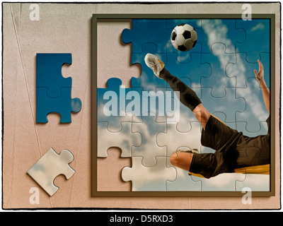 Teile des Puzzles bilden einen Fußballer, Darstellung in 3d. Stockfoto