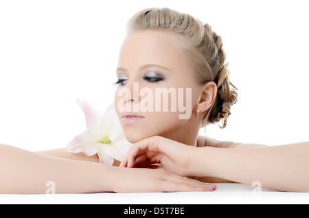 Die schöne Frau mit Lilie Blume Stockfoto