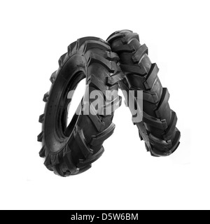 Neue, unbenutzte schwarze Grubber Reifen. Landwirtschaft und Landwirtschaft Hintergrundbild. Stockfoto