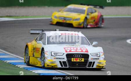 Deutschen Audi-Rennfahrer Timo Scheider fährt im ersten Rennen der Deutschen Tourenwagen Masters (DTM) auf dem Hockenheimring in Hockenheim, Deutschland, 29. April 2012. Foto: UWE ANSPACH Stockfoto