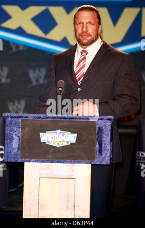 Levesque besucht aka Triple H eine Pressekonferenz mit WWE Superstars für "WrestleMania XXVII" statt im Hard Rock Stockfoto