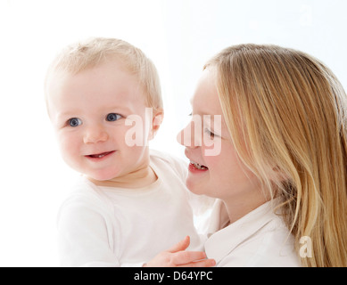 Junges Mädchen und baby Stockfoto