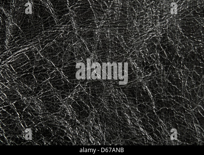 Nahaufnahme von glänzend und faltig aus schwarzem Leder-Textur. Stockfoto