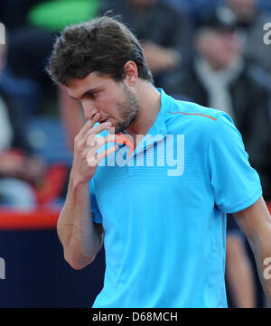 Frankreichs Gilles Simon spielt gegen Deutschlands Haas beim ATP World Tour 500 Turnier am Rothenbaum in Hamburg, Deutschland, 18. Juli 2012. Foto: Angelika Warmuth Stockfoto