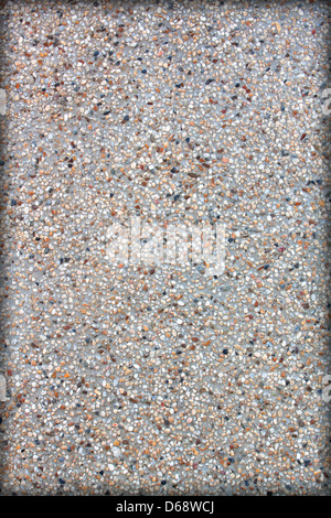 Winzige Kies Textur auf braune Betonwand Stockfoto