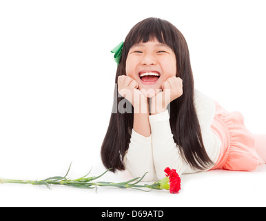 glückliche kleine Mädchen mit Nelke Blumen zum Muttertag Stockfoto