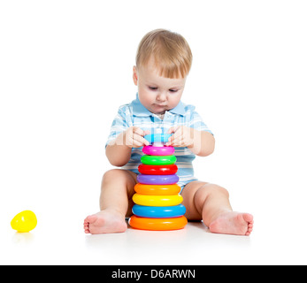 Baby Boy mit bunten Spielzeug spielen Stockfoto