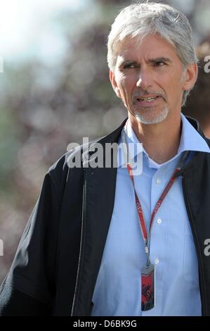 Ehemalige britische Formel-1-Pilot Damon Hill kommt das Fahrerlager an der Rennstrecke Circuit de Spa-Francorchamps in der Nähe von Spa, Belgien, 2. September 2012. Den Formel 1 Grand Prix von Belgien ist der 12. aus 20 Rennen im Jahr 2012. Foto: David Ebener Dpa +++(c) Dpa - Bildfunk +++ Stockfoto