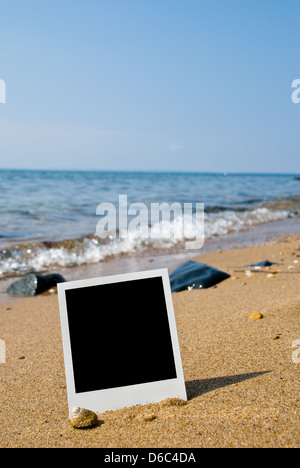 Fotokarte am Sandstrand Stockfoto