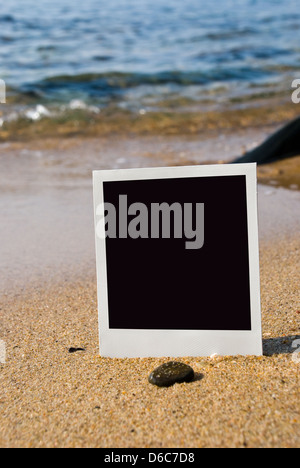 Fotokarte am Sandstrand Stockfoto