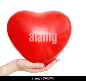 Herz-Ballon in der hand Stockfoto