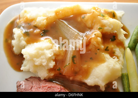 Kartoffelpüree mit Zwiebel-Soße Stockfoto