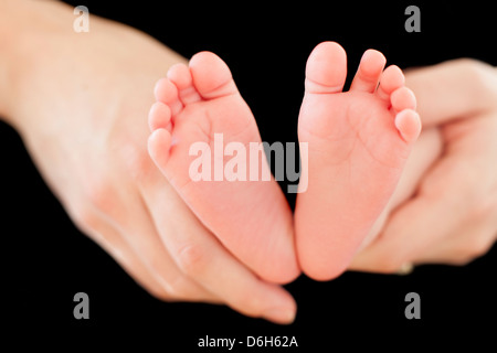 Des Babys Füße Stockfoto