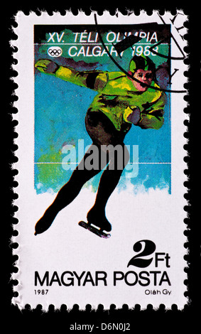 Briefmarke aus Ungarn, lange Strecke Eisschnelllauf, ausgestellt für die 1986 Calgary Olympischen Spiele darstellen. Stockfoto