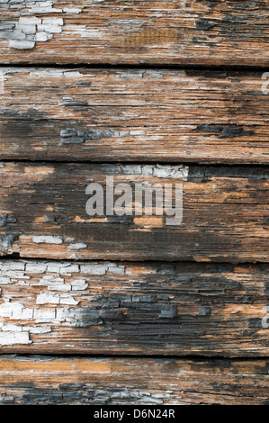 Alten geknackt Farbe auf alten Brettern. Holzwand Stockfoto