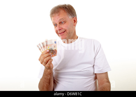 Mann mit Geld Stockfoto