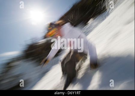 Bewegung verschwommenes Bild von einem erfahrenen Skifahrer, Stowe, VT, USA Stockfoto