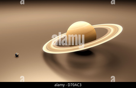 Eine gerenderte Größenvergleich Blatt zwischen den Planeten Erde und Saturn. Stockfoto